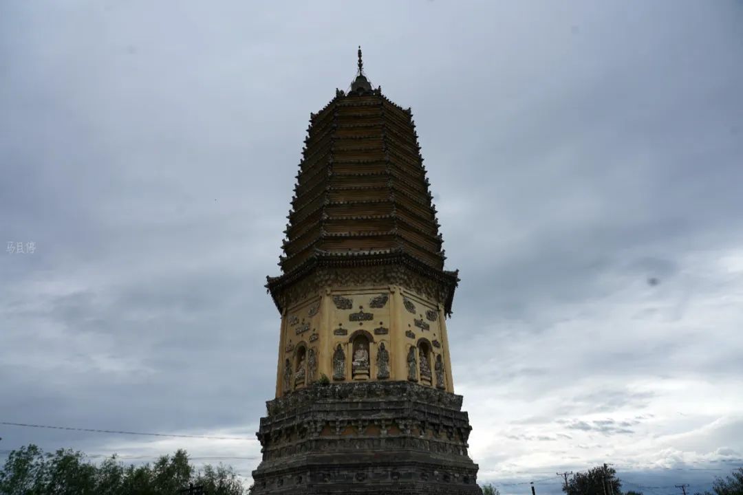 DƬ